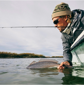 image of man fishing with fenwick rod